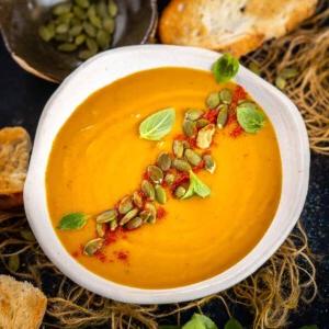 This spicy Roasted Butternut Squash Sweet Potato Soup has become my new fall favorite. Make it in under an hour for a hearty meal (vegan, gluten-free).