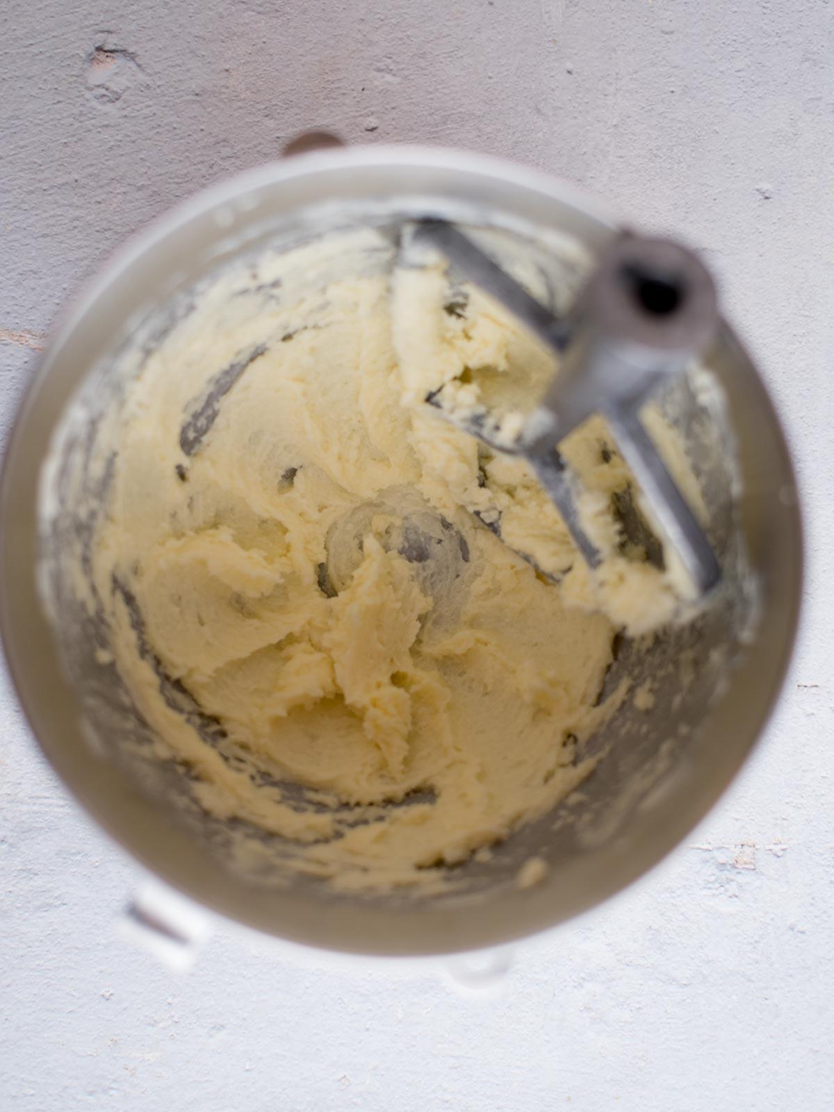 butter and sugar creamed together in a mixing bowl