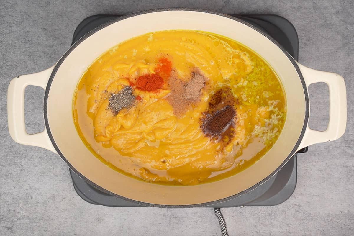 Puree, vegetable broth and spices added to the pot.