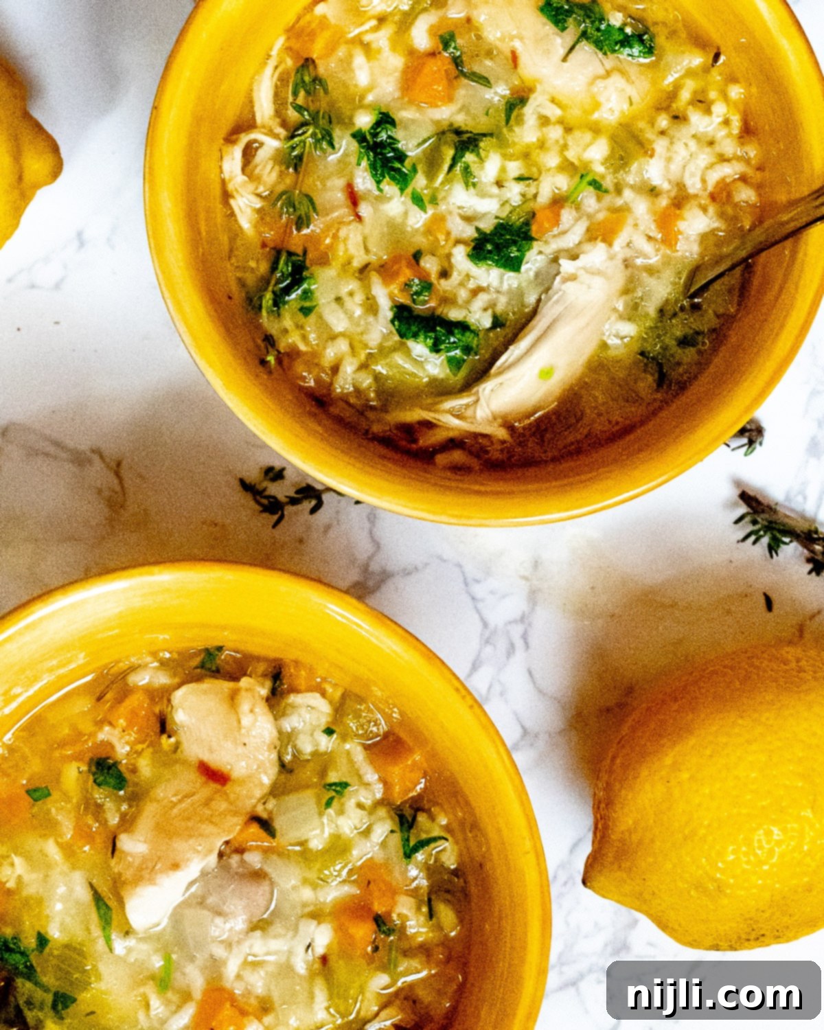 Your New Favorite Instant Pot Chicken and Rice Soup 5 two bowls of instant pot chicken and rice soup