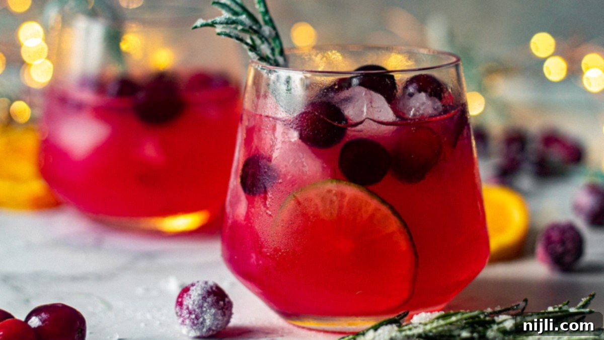 Mistletoe Kiss Margarita 3 two glasses of frosted mistletoe margarita