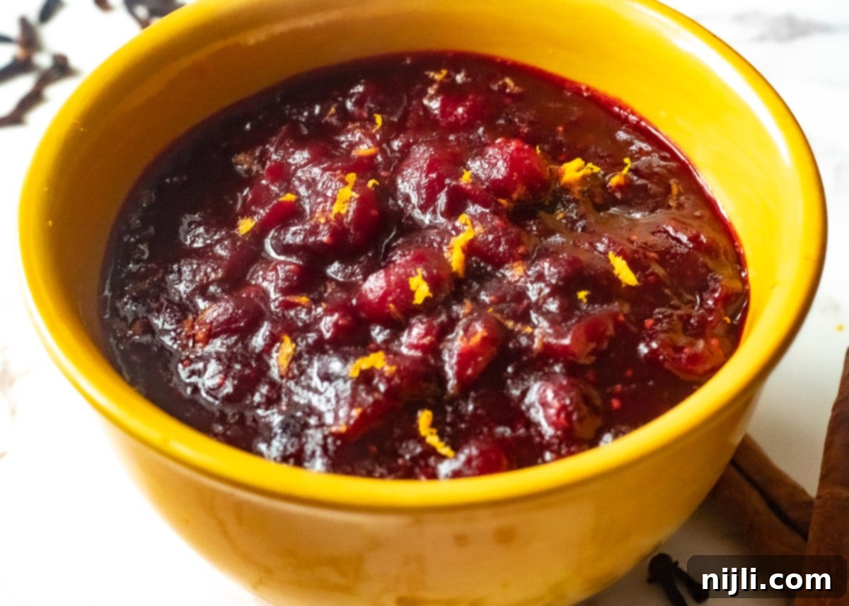 bowl of keto cranberry sauce, a perfect sugar-free holiday side