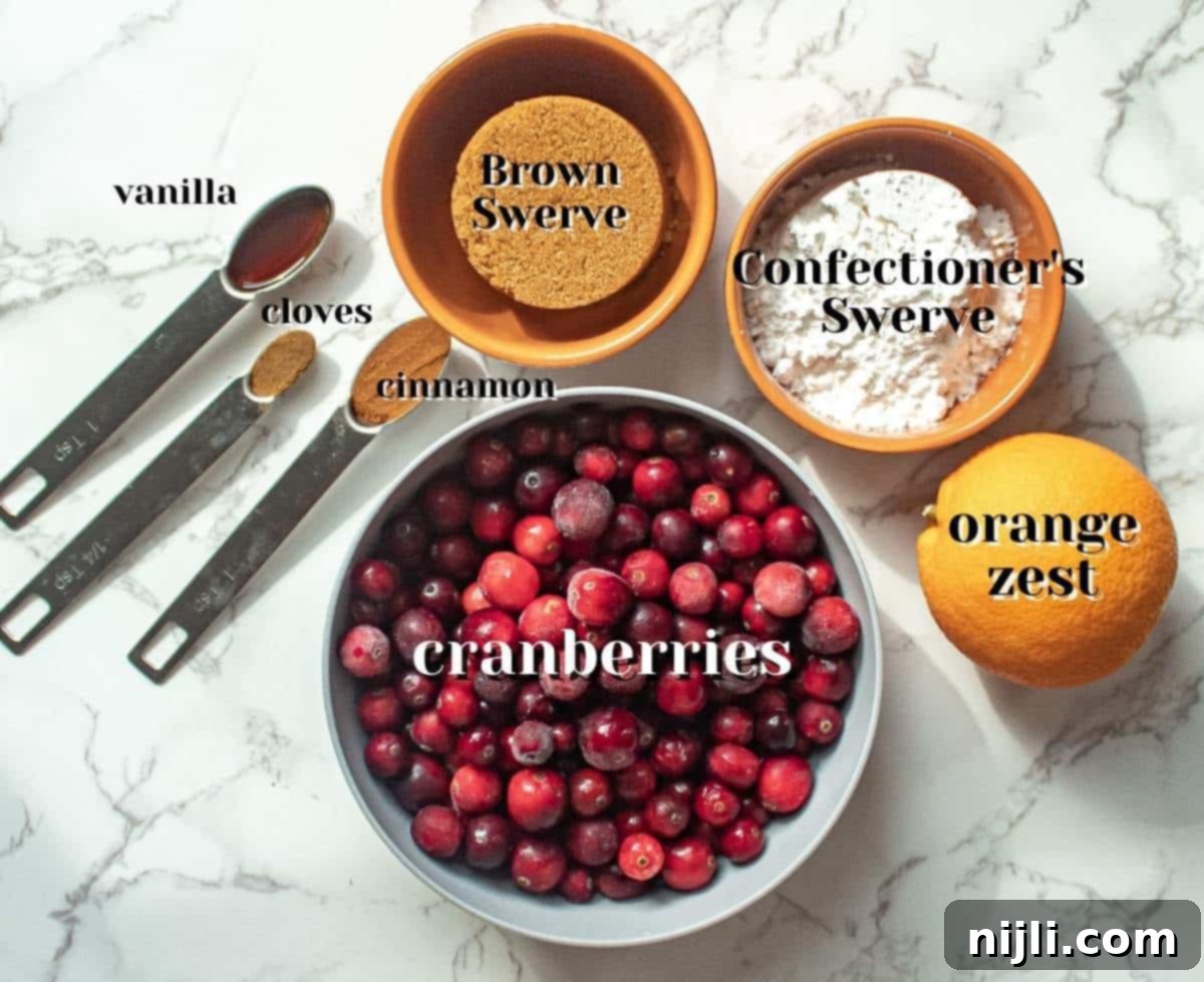 ingredients for keto cranberry sauce including cranberries, orange zest, and sweeteners