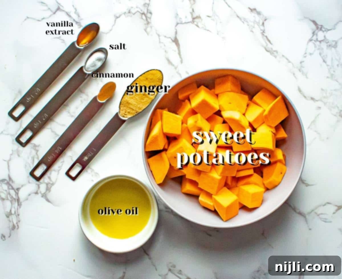 Crispy Air Fryer Sweet Potato Chunks 3 Ingredients laid out for air fryer sweet potato chunks, including sweet potatoes, brown sugar, cinnamon, and maple syrup