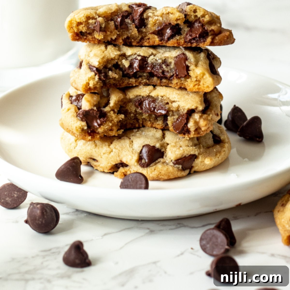 Vegan Chocolate Chip Cookies 7 Stack of dairy free chocolate cookies with melted chocolate chips