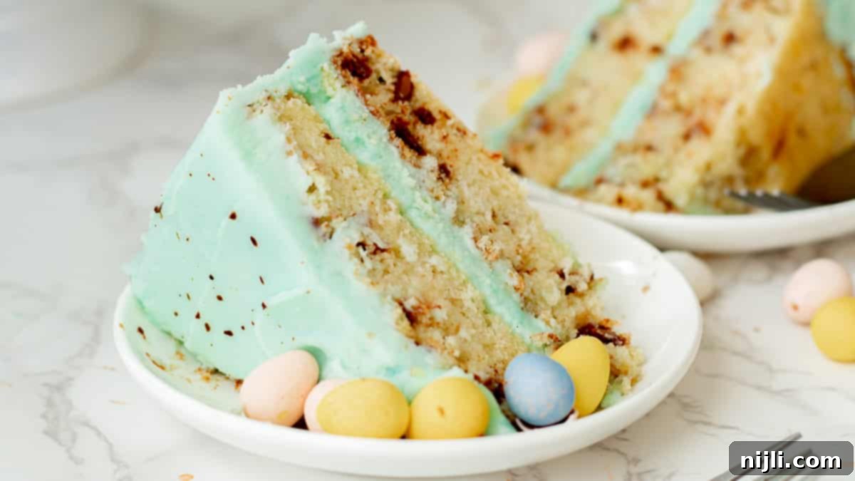 Speckled Candy Cake 7 mini eggs cake slice on a plate