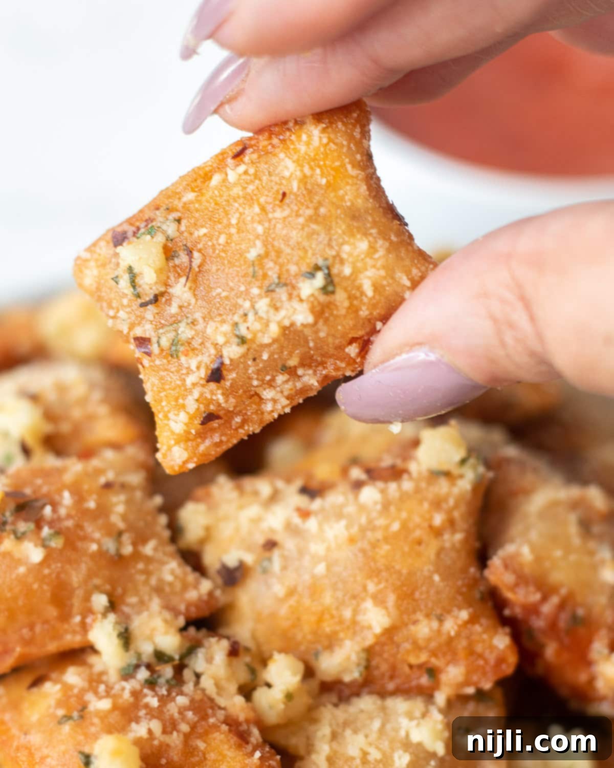 Air Fried Pizza Perfection 3 air fryer pizza rolls with garlic butter topping