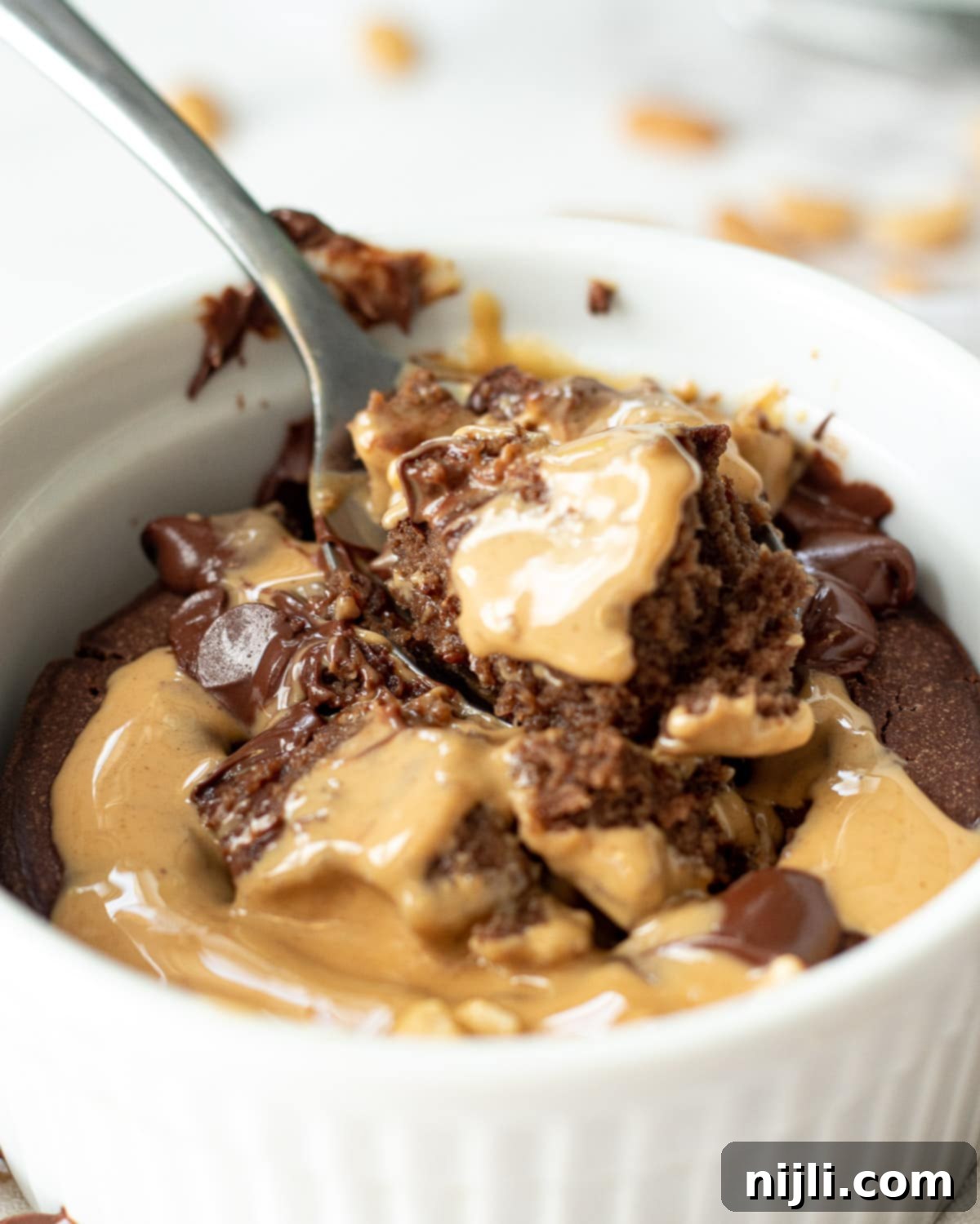 Single-Serving Protein Baked Oats 3 protein baked oats with a spoon