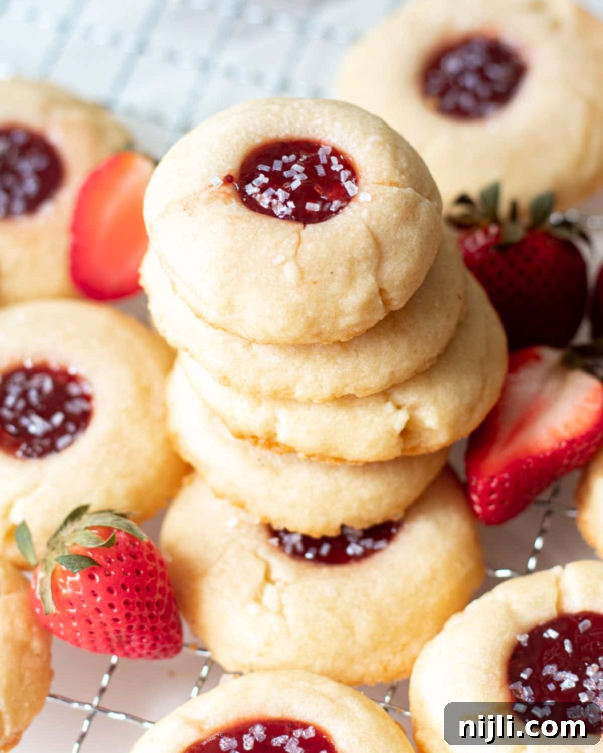 Strawberry Shortbread Delights 3 stacked strawberry butter cookies
