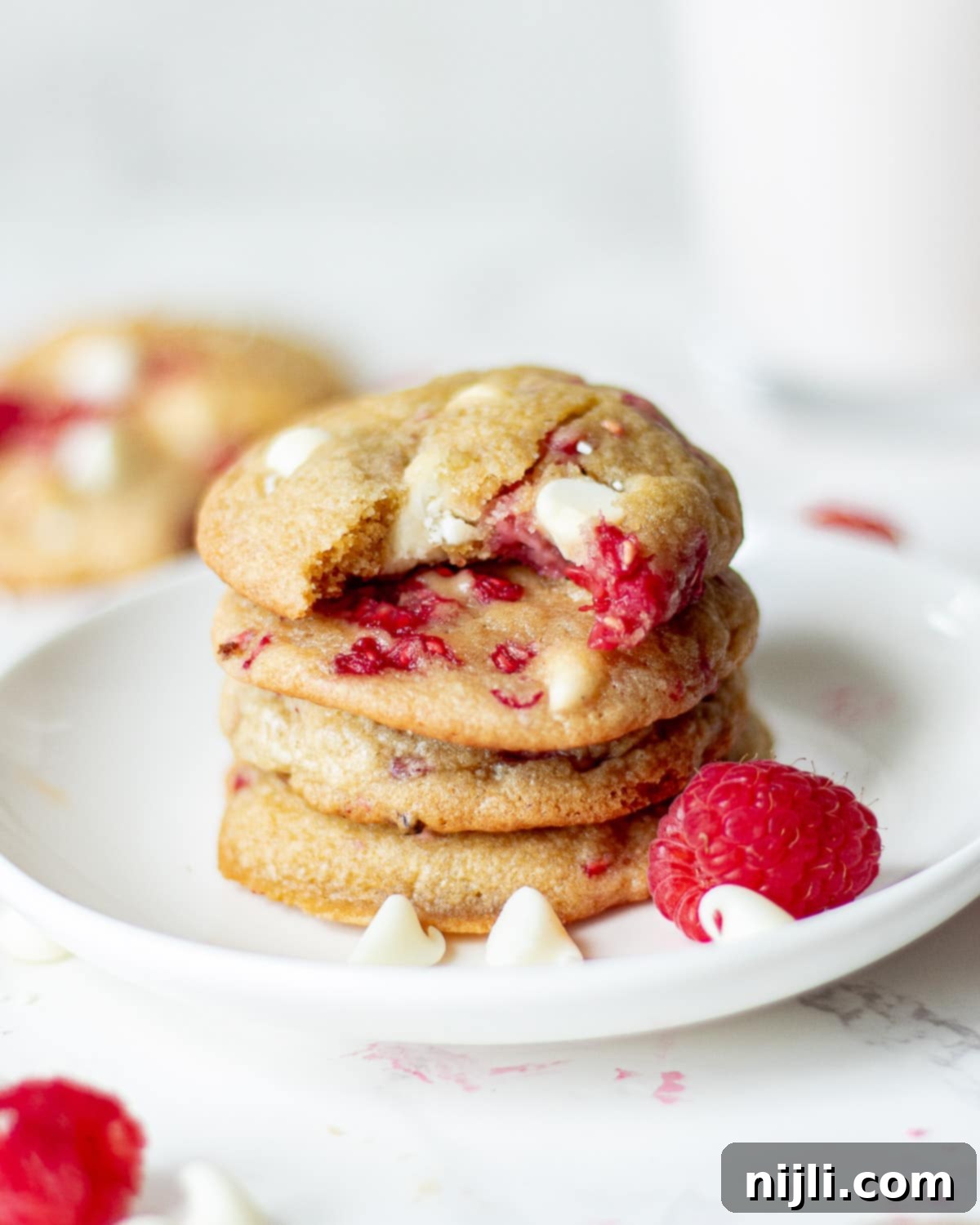 White Chocolate Raspberry Delights 3 stack of raspberry white chocolate cookies