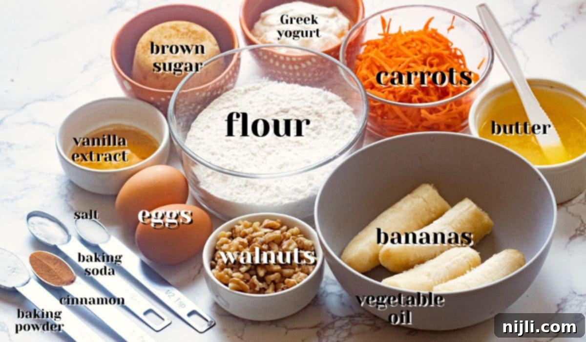 Golden Carrot Banana Muffins 5 Ingredients for healthy banana carrot muffins laid out on a table.