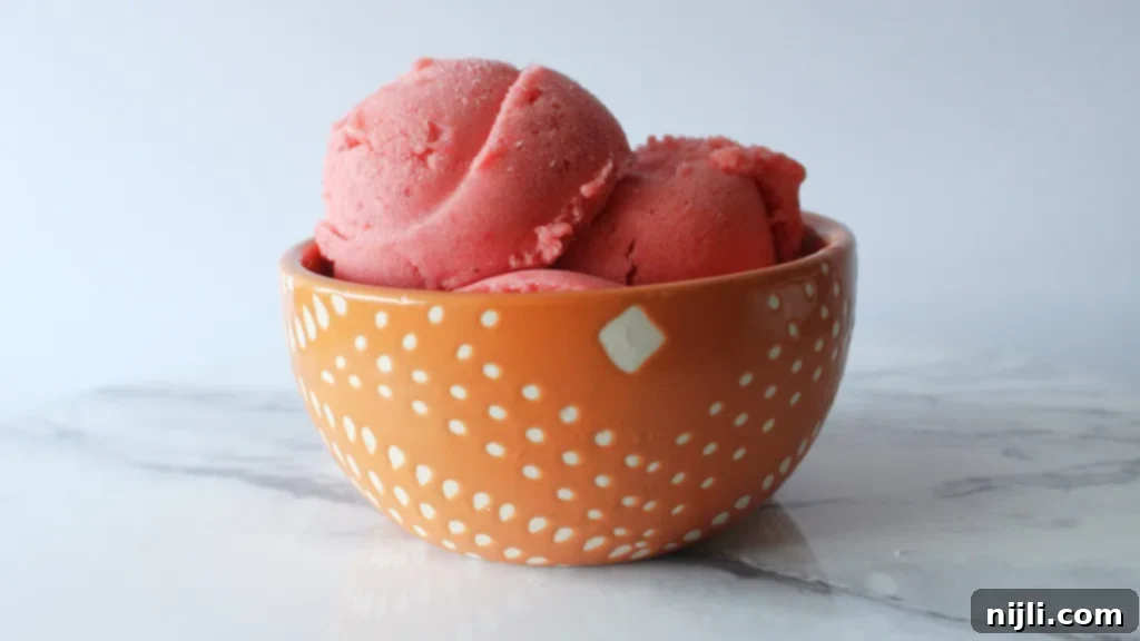 Refreshing Strawberry Banana Sorbet 3 Homemade strawberry banana sorbet in a bowl