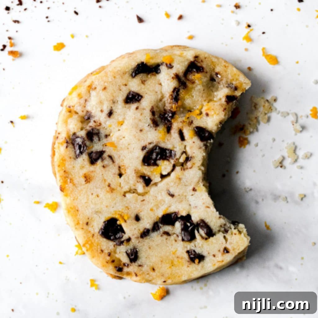 Rescue Dry Cookie Dough From Crumbly Disaster 2 chocolate orange cookie with a bite taken out