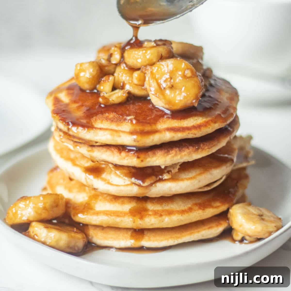 stack of bananas foster pancakes