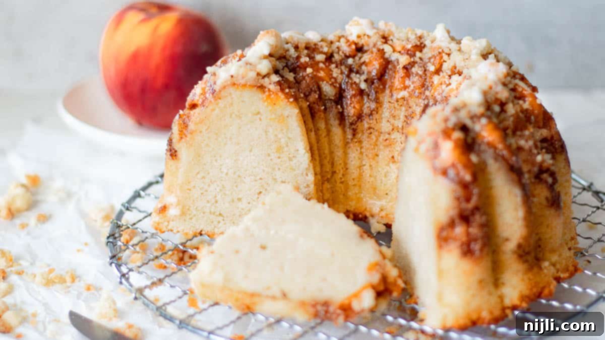 Southern Peach Pound Cake 8 sliced peach cobbler pound cake on a rack