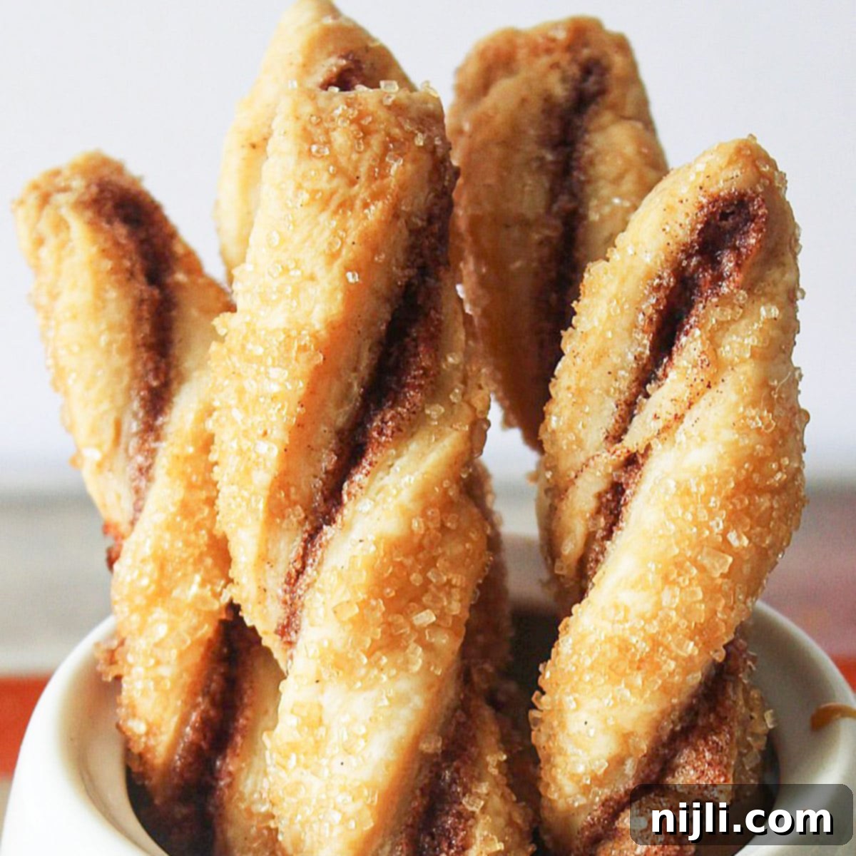 Flaky Pastry Twists 6 pie crust cookies twists, golden brown and ready to eat