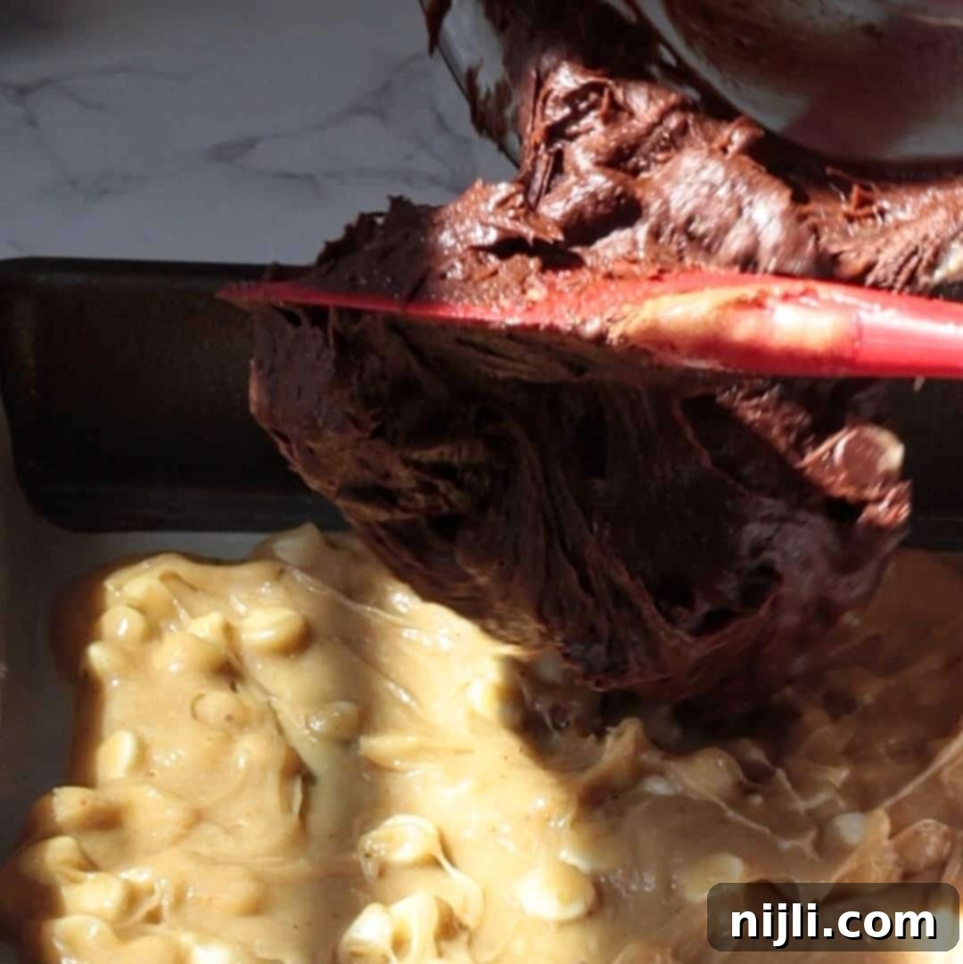 Step 4: Layering blondie and brownie batter in a baking pan.
