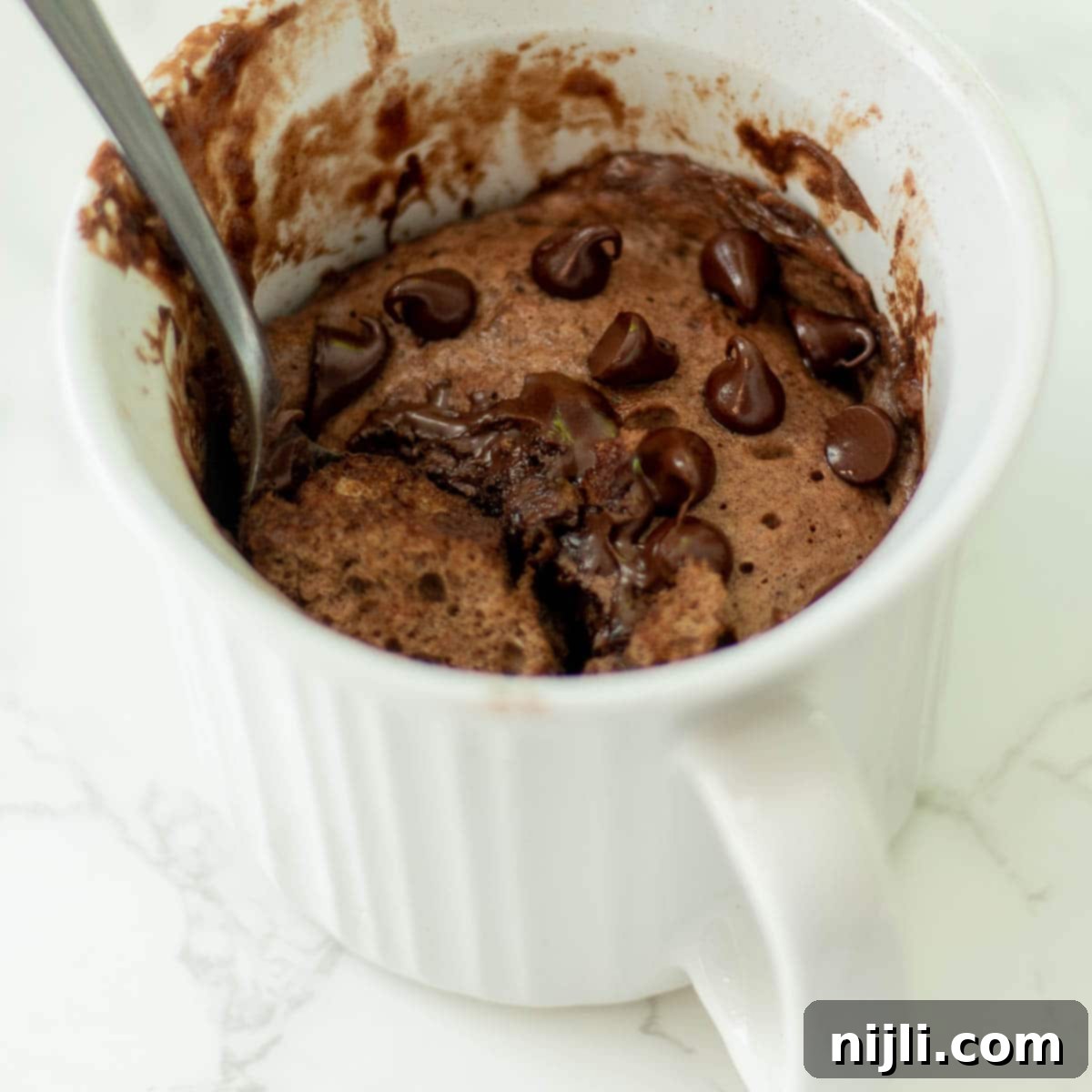 Healthy Protein Mug Cake in Minutes 2 protein mug cake topped with chocolate chips