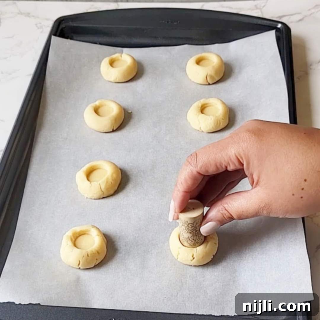 Iced Thumbprint Cookies 6 thumbprint cookies with icing step 2