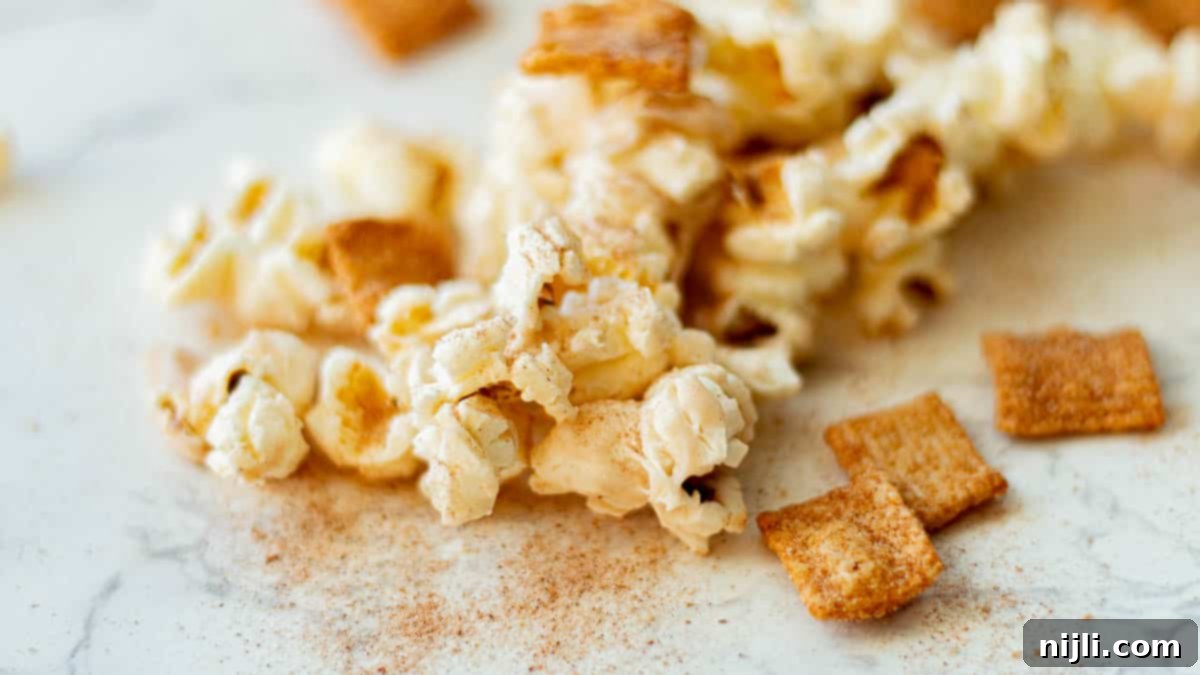 Close-up of Cinnamon Toast Crunch Popcorn, highlighting the coating and texture