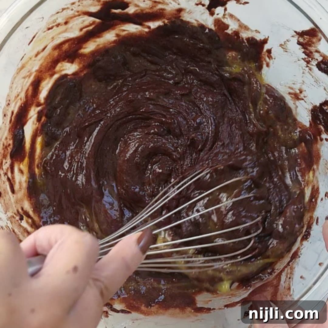 Decadent Chocolate Cake with Velvety Cream Cheese Frosting 9 chocolate cake with cream cheese frosting step 3