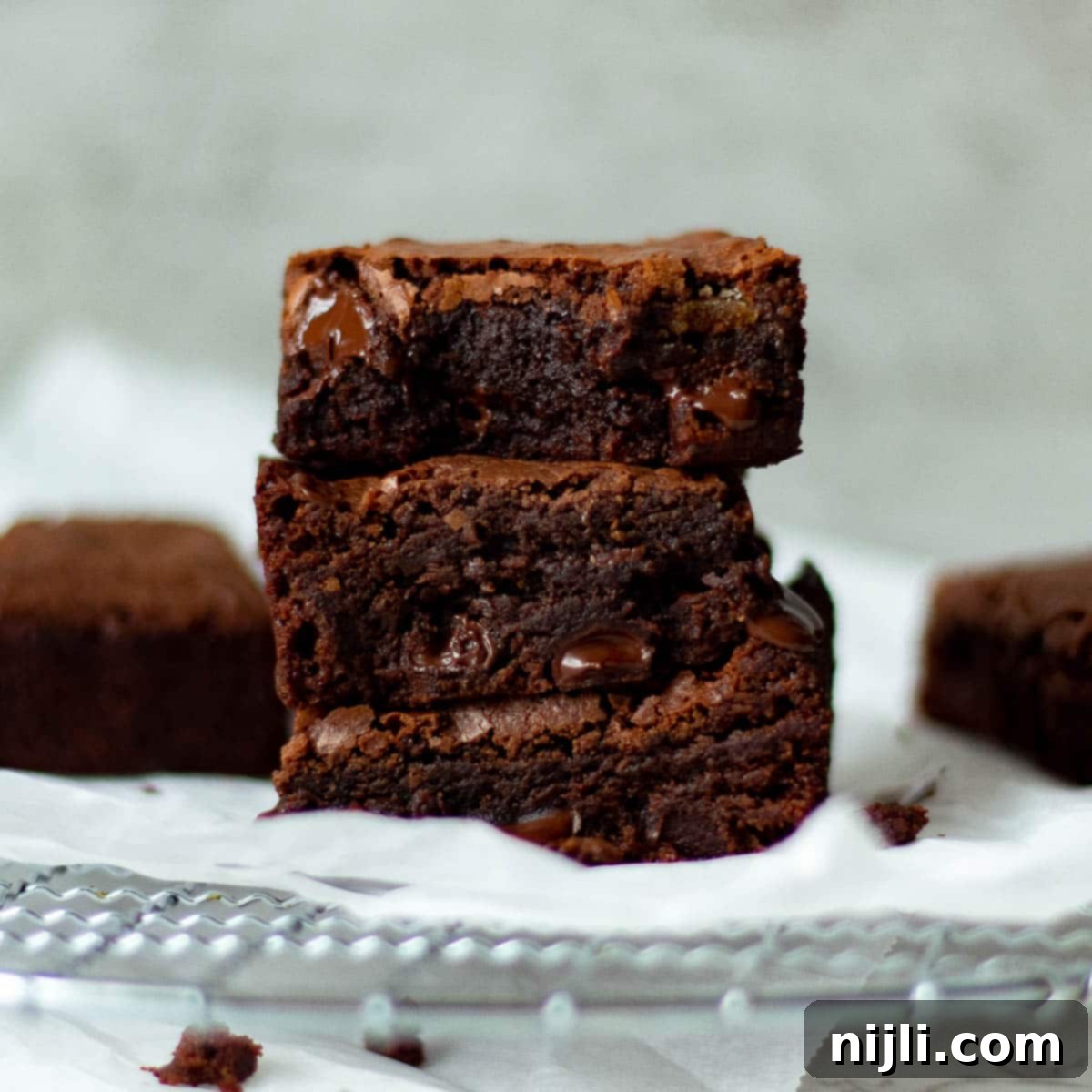dairy free brownies stacked on a tray