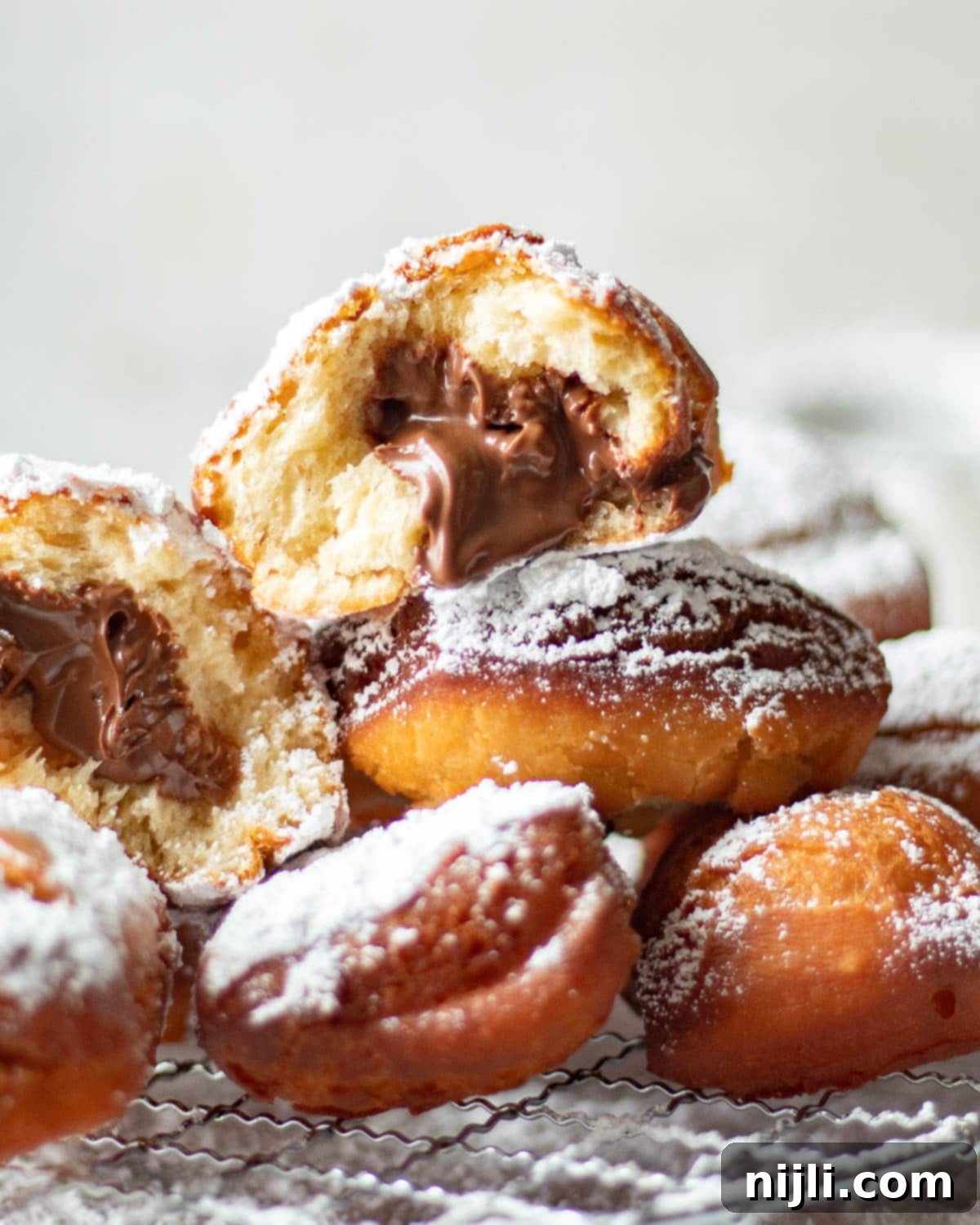 chocolate beignets, explaining how to pronounce