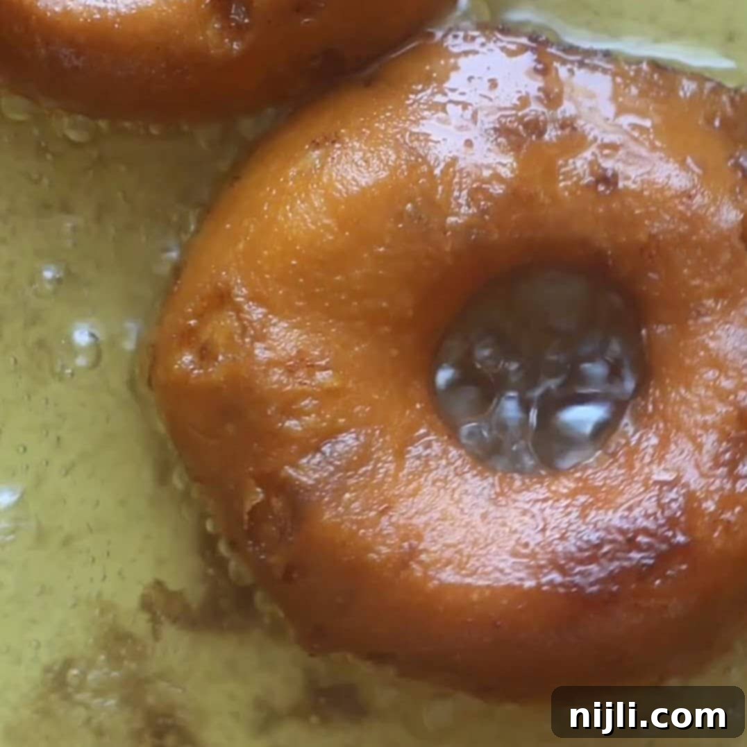 Pillsbury's Signature Cinnamon Swirl Donuts 8 cinnamon roll donuts recipe step 3