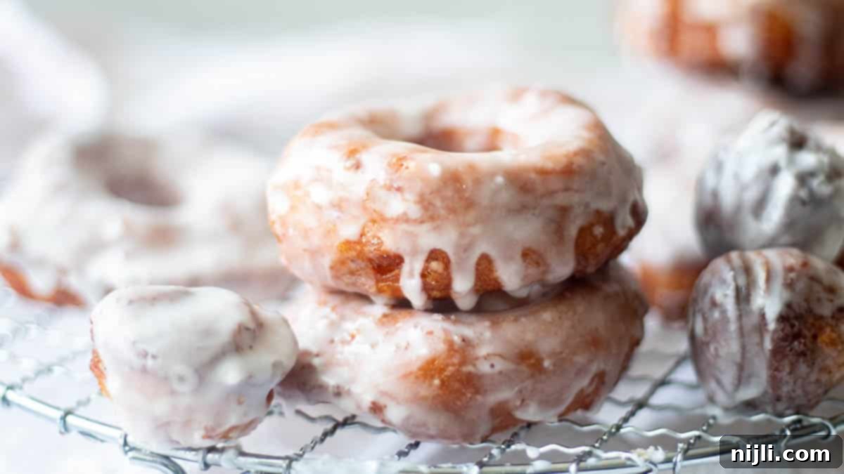 Pillsbury's Signature Cinnamon Swirl Donuts 10 cinnamon roll donuts recipe on a rack