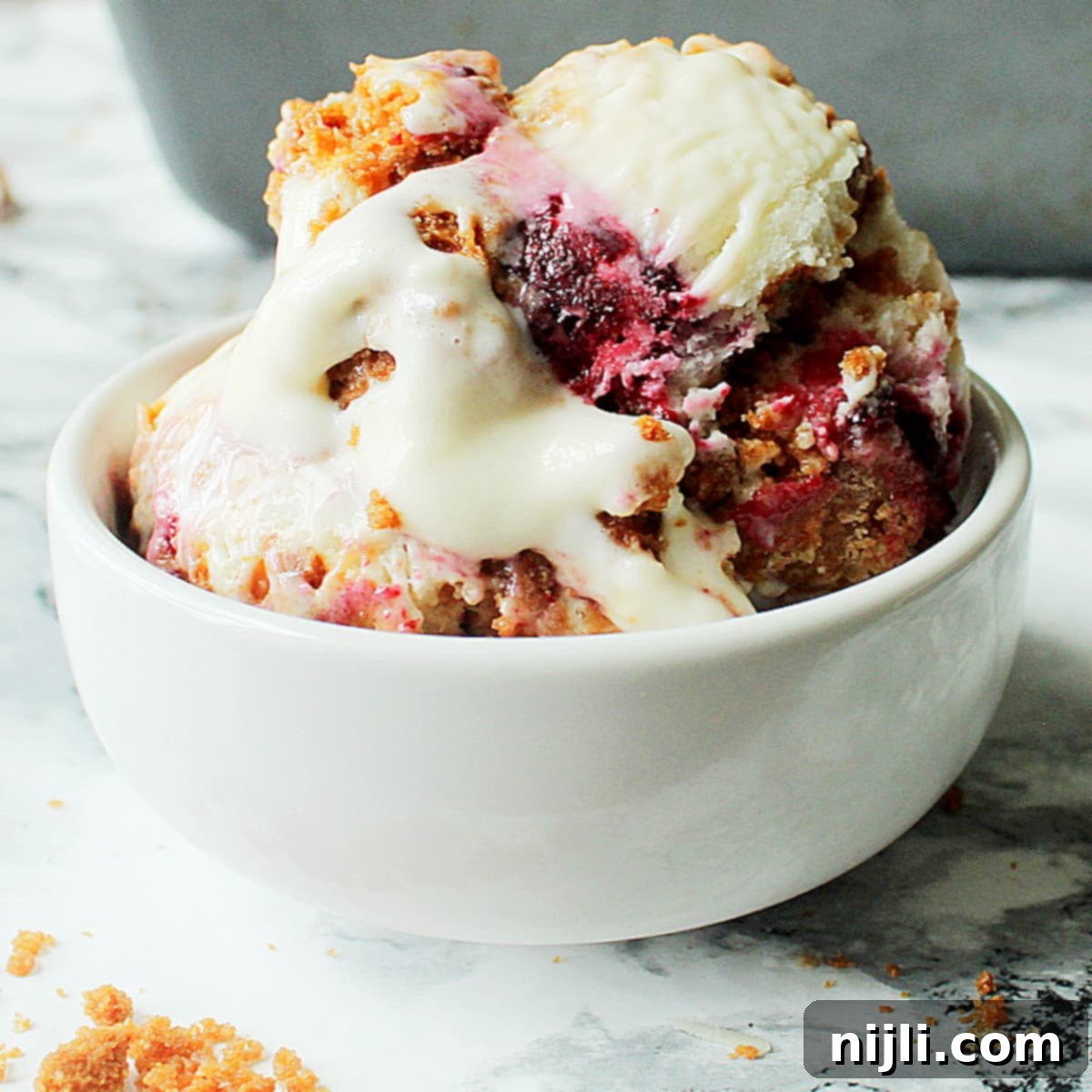 Berrylicious Unlock the Secrets to Lasting Summer Berries 3 blackberry cheesecake ice cream in a bowl
