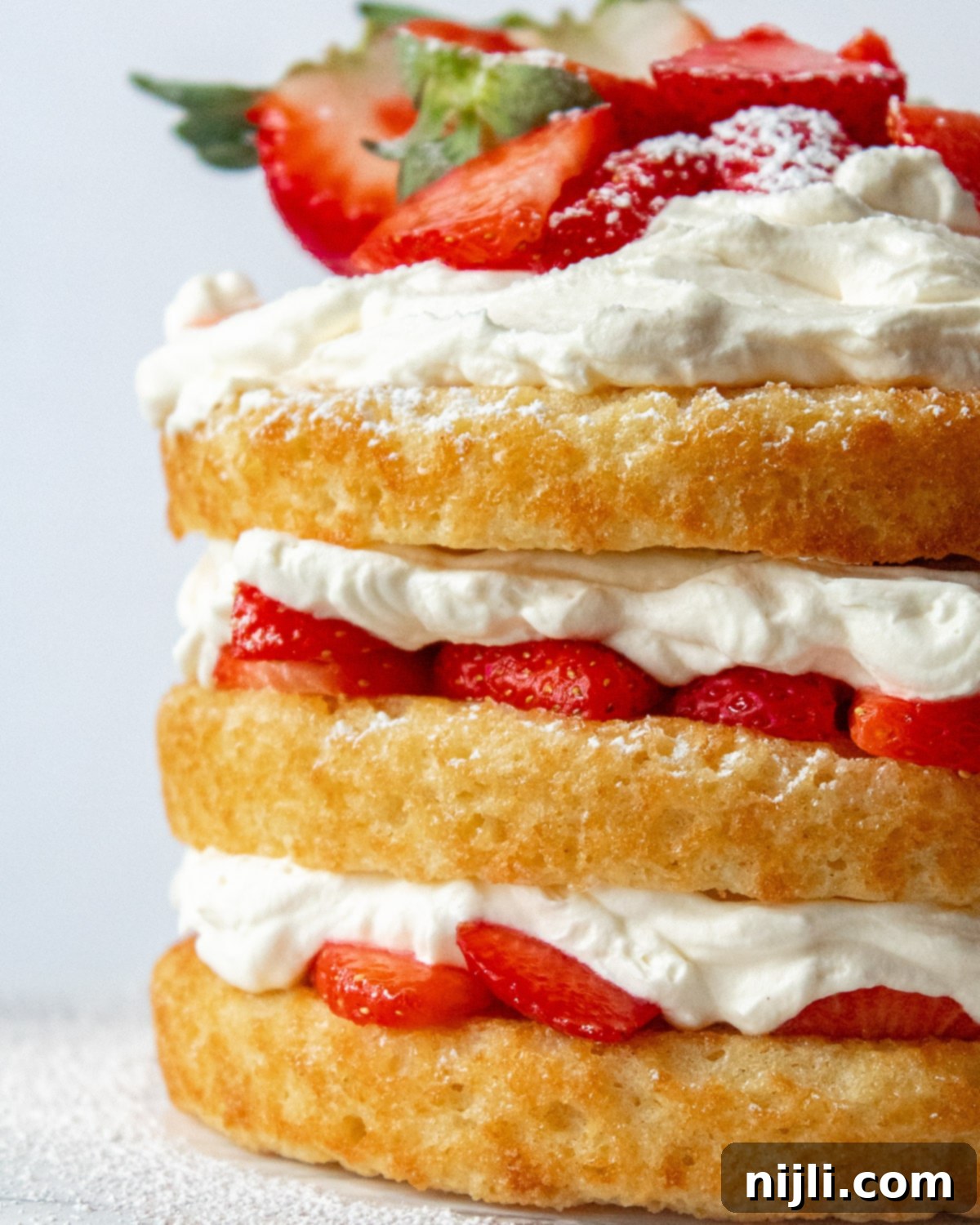 Berrylicious Unlock the Secrets to Lasting Summer Berries 4 closeup of cake with fresh strawberries in the middle
