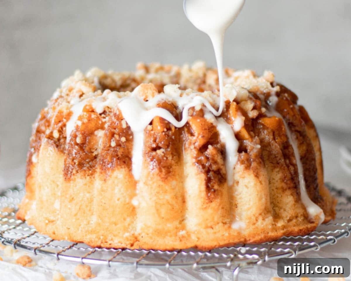 Pound Cake Versus Bundt Cake Explained 6 drizzling icing on peach cobbler pound cake