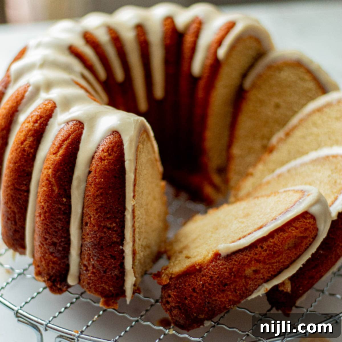 Pound Cake Versus Bundt Cake Explained 8 rum soaked cake, cut on a wire rack