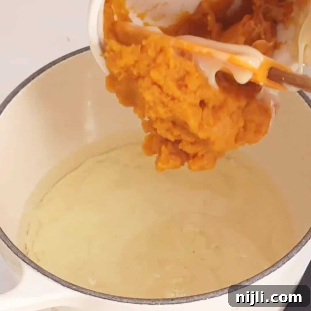 Starbucks Pumpkin Spice Sauce 7 starbucks pumpkin sauce step 2: whisking in condensed milk and pumpkin puree