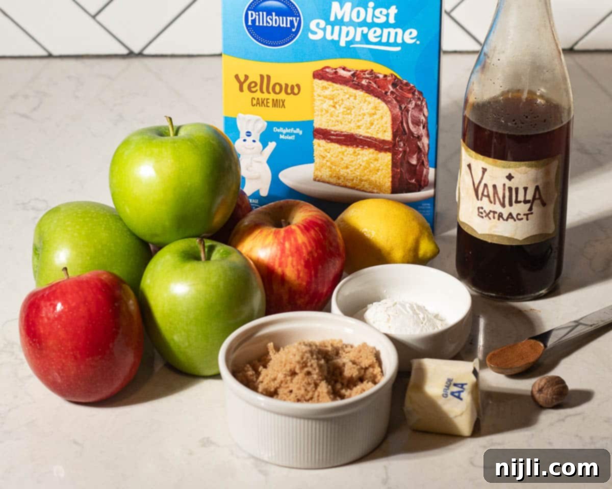 Effortless Cake Mix Apple Cobbler 4 Ingredients for apple cobbler with yellow cake mix, including fresh apples, vanilla extract, butter, cinnamon, brown sugar, and Pillsbury yellow cake mix.