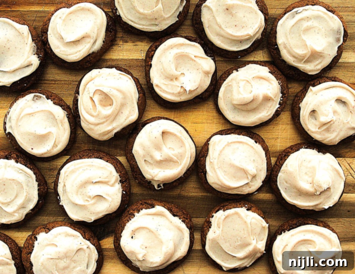 Stout-Infused No-Chill Gingerbread Cookies with Brown Butter Cream Cheese Frosting 4 Overhead shot of No-Chill Gingerbread Cookies with Stout and Brown Butter Cream Cheese Frosting, beautifully arranged and ready for a holiday spread.