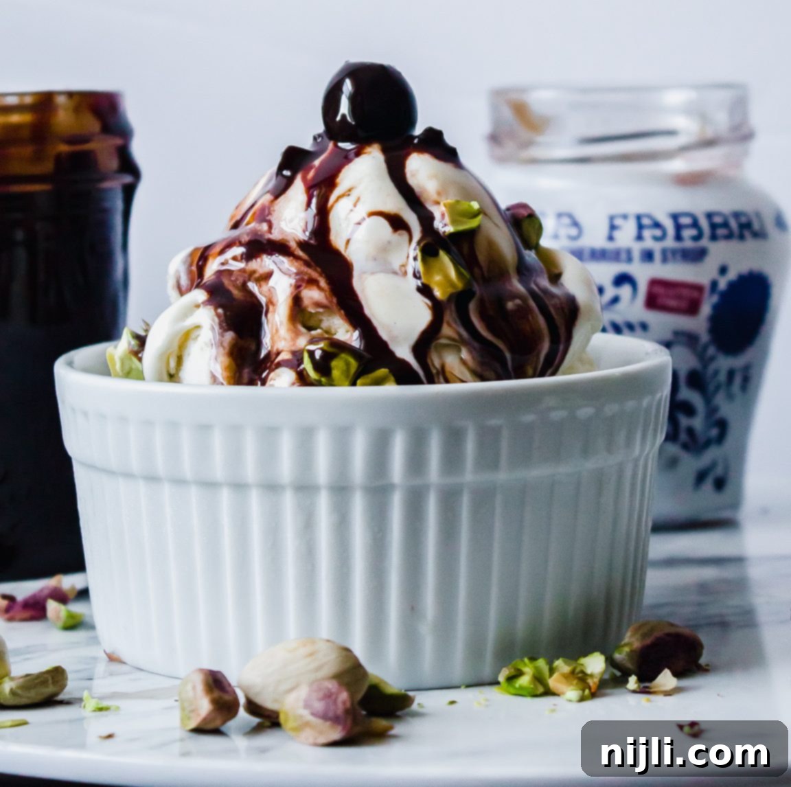 Decadent Amarena Cherry Chocolate Sauce 2 Homemade Amarena Cherry Chocolate Sauce drizzled over ice cream