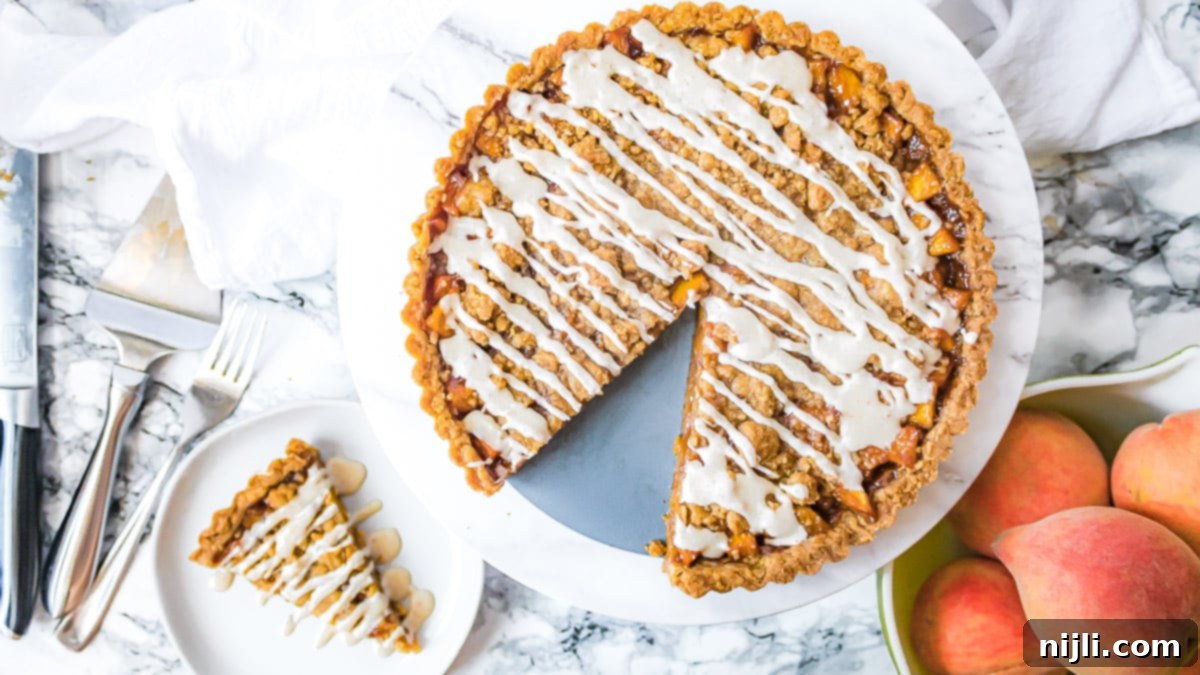Golden Peach Brown Butter Tart 4 brown butter peach tart from above with a slice cut out