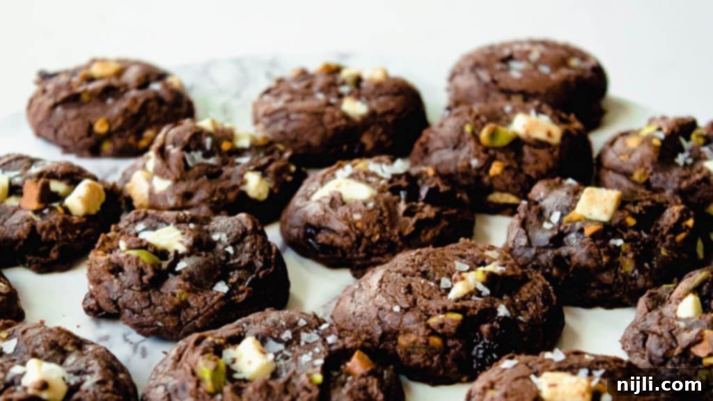 Decadent White Chocolate Cherry Pistachio Brownie Cookies 5 Brownie Mix cookies on a tray