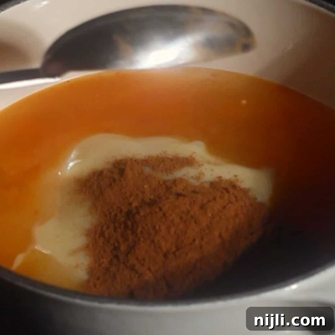 Starbucks Style Pumpkin Cold Foam 7 Pumpkin puree, condensed milk, and pumpkin spice added to saucepan to make pumpkin cold foam base.