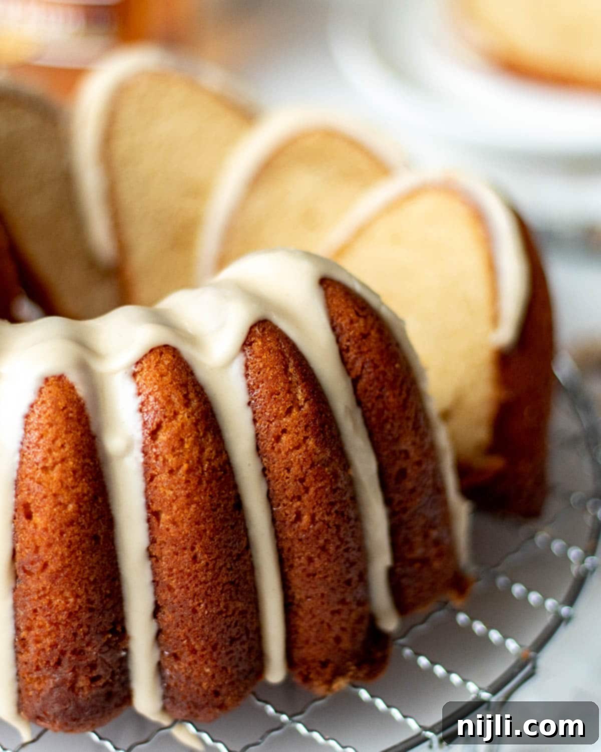 Rum-Infused Pound Cake with Nutty Brown Butter Glaze 10 rum soaked cake on a rack