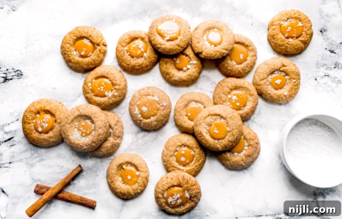 Stacked salted caramel Christmas cookies from above with flaky salt