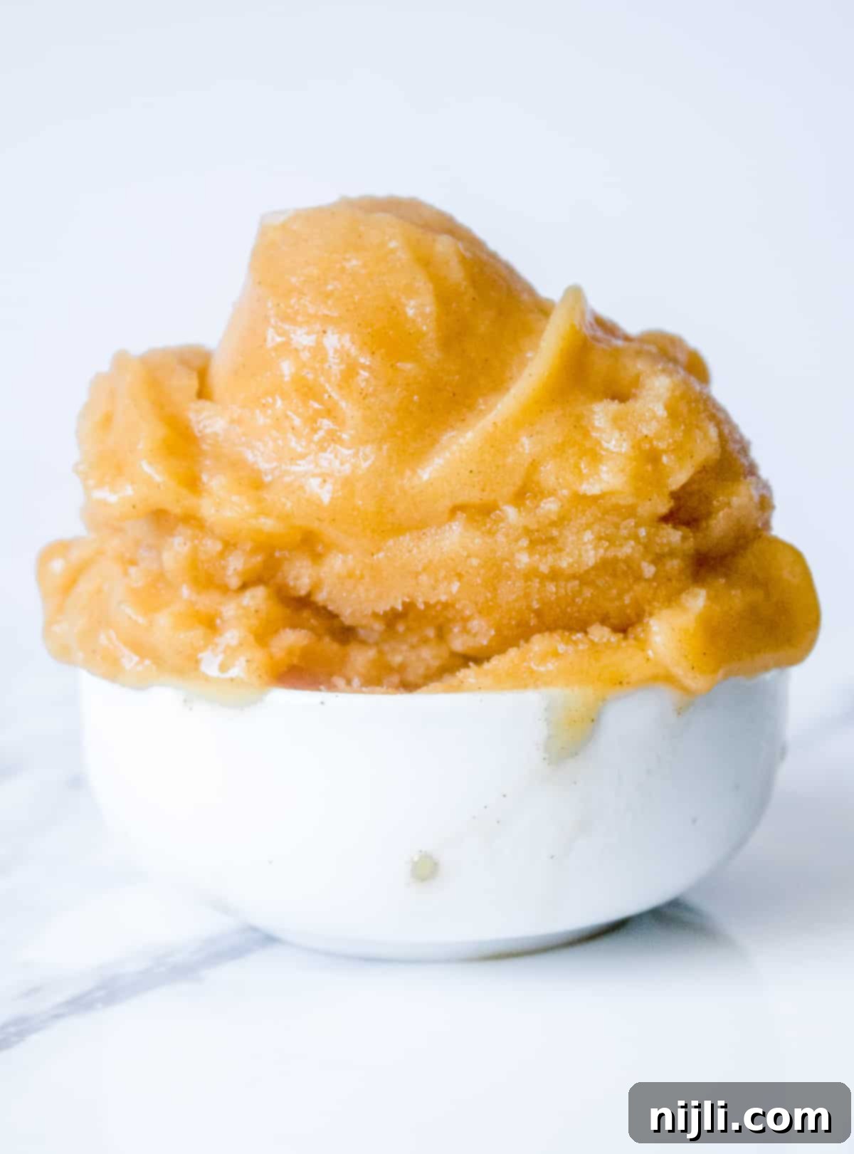 peach sorbet in a bowl