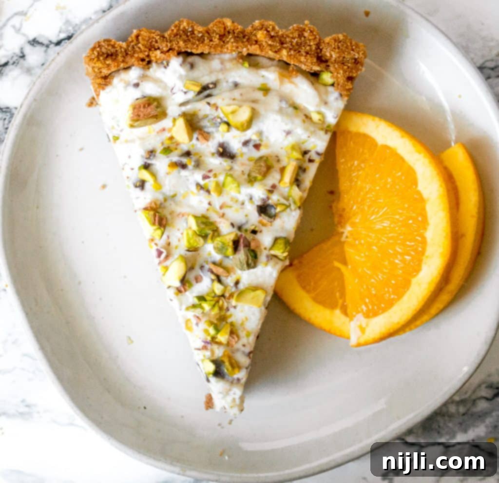 Overhead view of a slice of cannoli pie with the crust visible