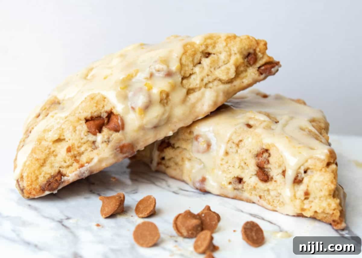 Spiced Orange Glazed Cinnamon Chip Scones 3 cinnamon chip scones starbucks recipe on a tray