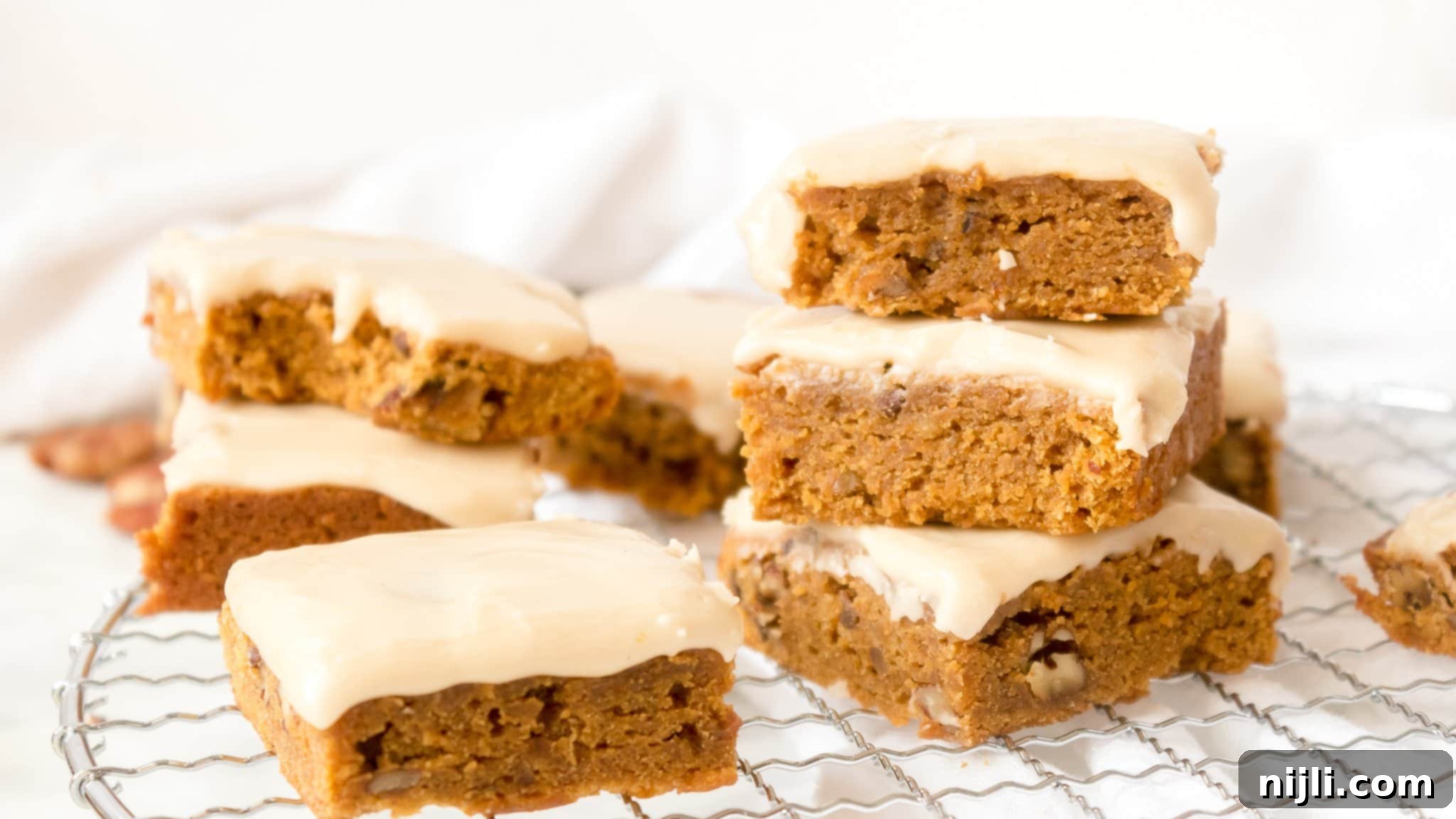 Spiced Pumpkin Blondies with Apple Cider Drizzle 5 Easy Pumpkin Blondies Recipe with Toasted Pecan and Apple Cider Glaze | Chenée Today