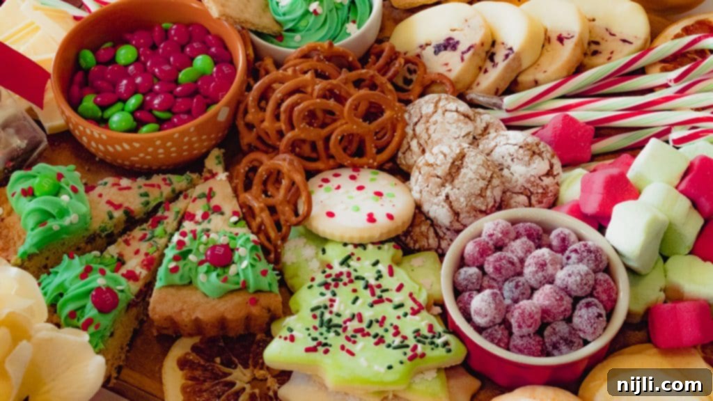 Holiday Grazing Board 5 A festive Christmas Candy Charcuterie Board, arranged with various sweets and treats