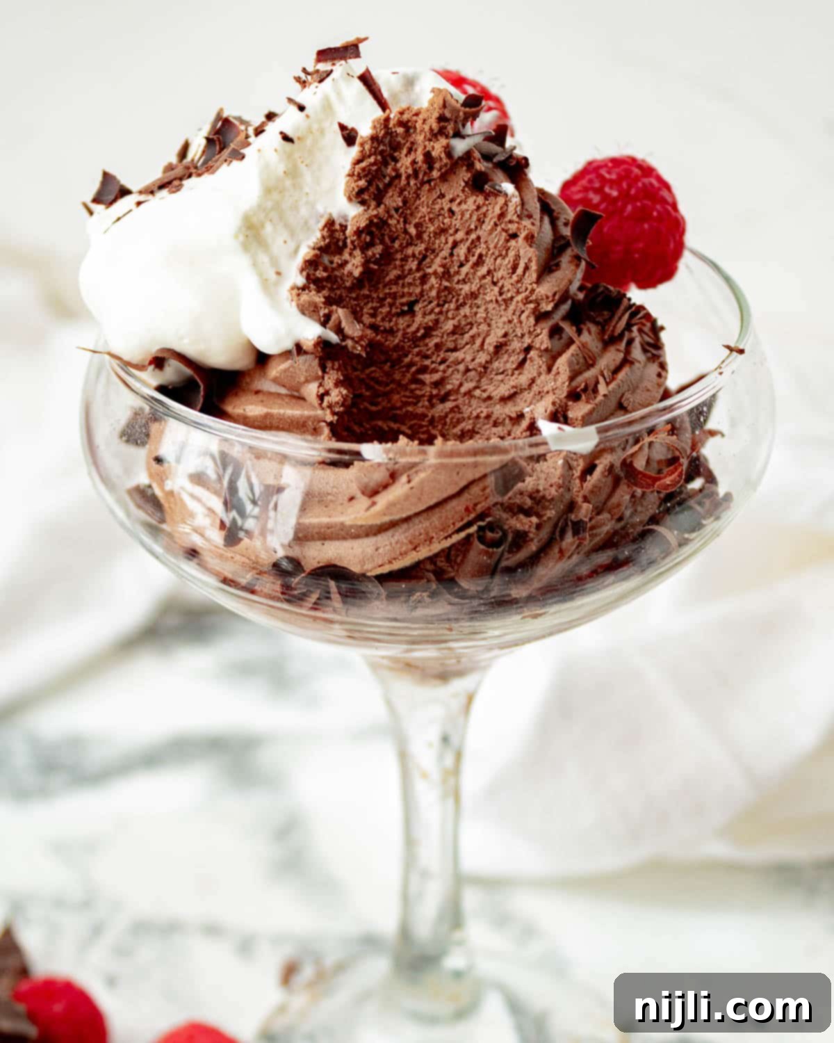 Decadent Keto Chocolate Mousse 3 keto chocolate mousse cake in a glass dish