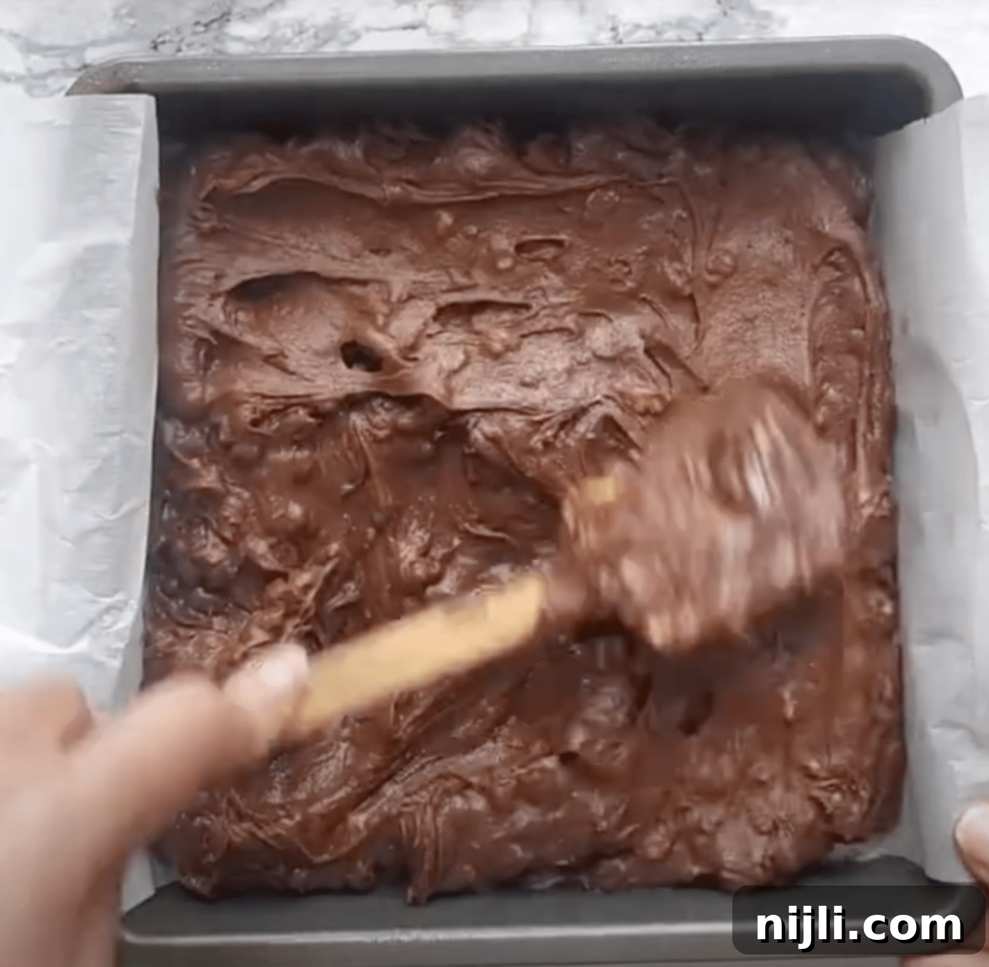 Gooey Chocolate Walnut Brownies 9 Walnut brownies batter in the pan ready to bake.