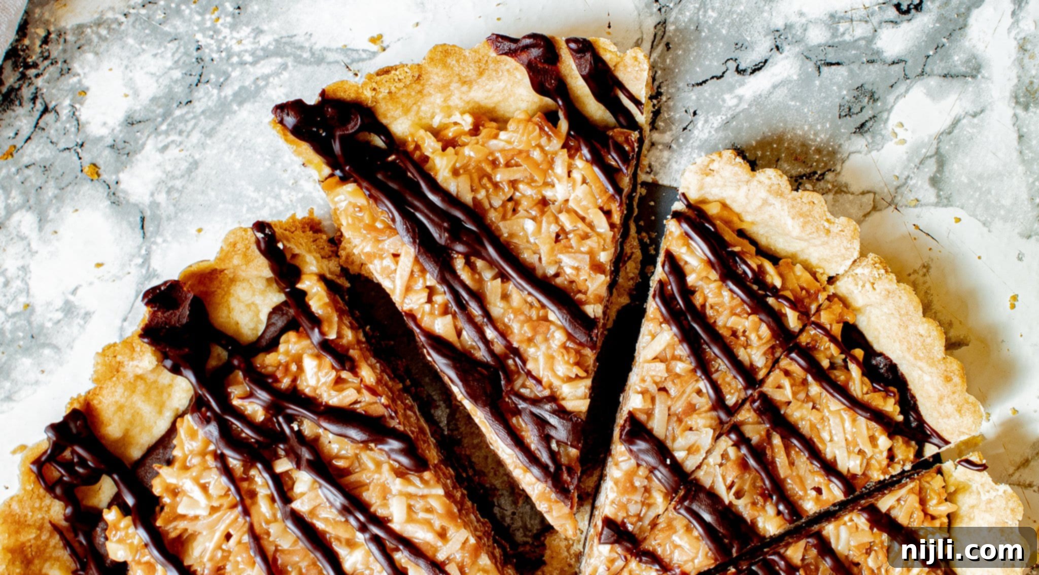 Toasted Coconut Caramel Pie 2 Samoa dessert tart with chocolate drizzle and toasted coconut